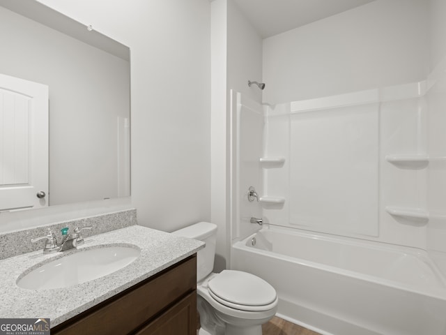 131 Hampton Ter, Dallas, GA 30157 - full bathroom featuring wood finished floors, toilet, vanity, and  shower combination
