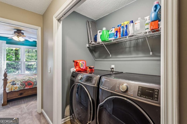 5876 Bridgemont Pl NW, Acworth, GA 30101 - clothes washing area featuring carpet flooring, washer and clothes dryer, a textured ceiling, ceiling fan, and laundry area