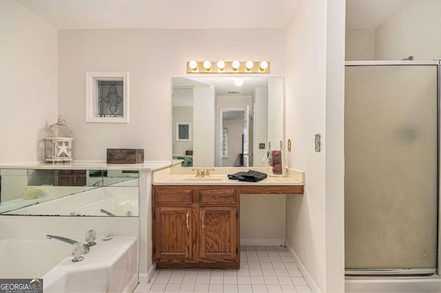 full bath featuring a bath, a shower stall, tile patterned floors, and vanity