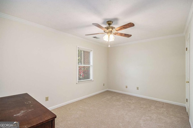 interior space with light carpet, crown molding, and baseboards