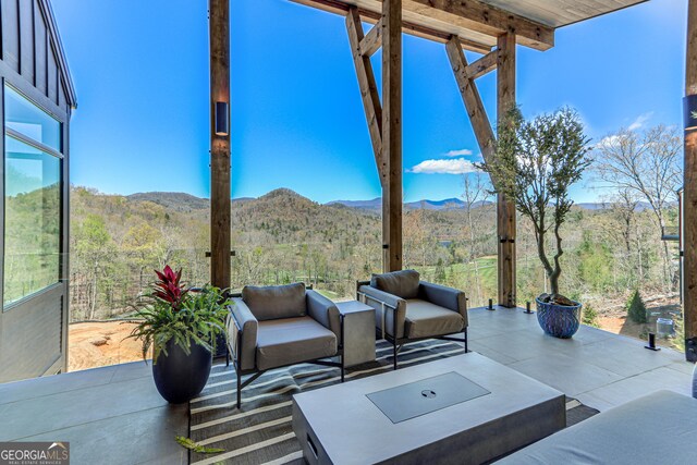 631 Bent Grass, Clayton, GA 30525 - view of patio featuring outdoor lounge area, a mountain view, and a wooded view