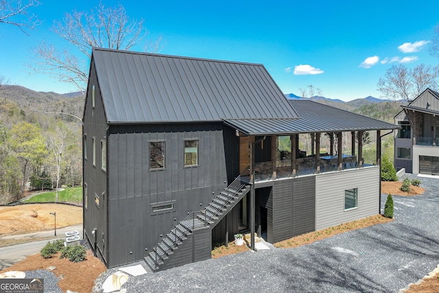 631 Bent Grass, Clayton, GA 30525 - view of front of home featuring stairs, a mountain view, and metal roof