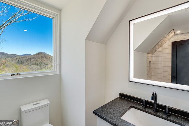 631 Bent Grass, Clayton, GA 30525 - bathroom featuring toilet, vanity, and a mountain view