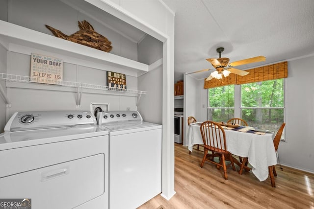 82 Dogwood Ct, Sparta, GA 31087 - laundry room with light wood finished floors, washer and dryer, laundry area, and ceiling fan
