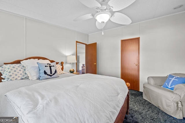 82 Dogwood Ct, Sparta, GA 31087 - carpeted bedroom featuring ceiling fan and ornamental molding
