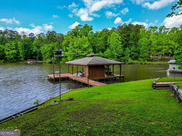 82 Dogwood Ct, Sparta, GA 31087 - view of dock with a lawn, a wooded view, boat lift, and a water view