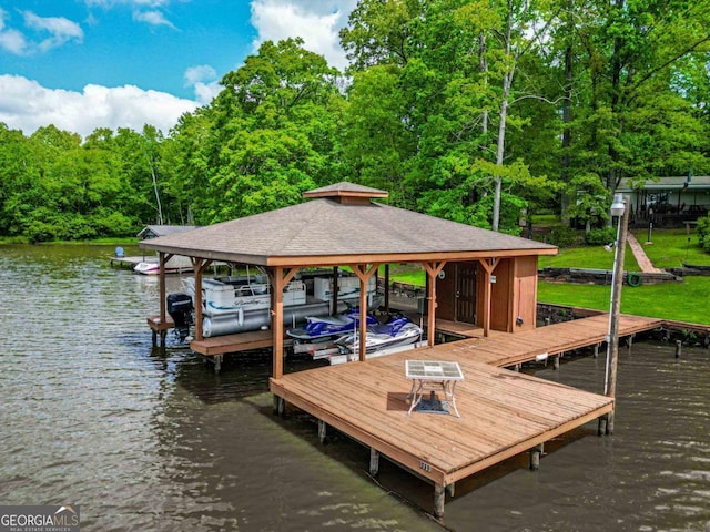 82 Dogwood Ct, Sparta, GA 31087 - dock area featuring a view of trees, a water view, and boat lift