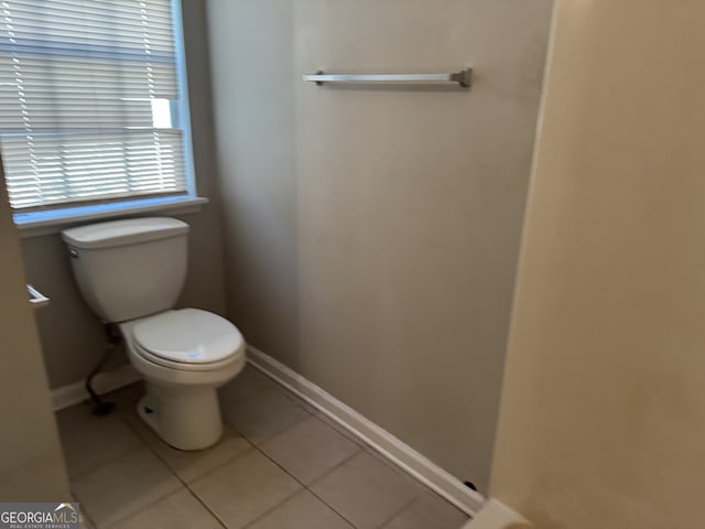 3260 Rivermist Cv, Decatur, GA 30034 - bathroom with toilet, tile patterned floors, and baseboards