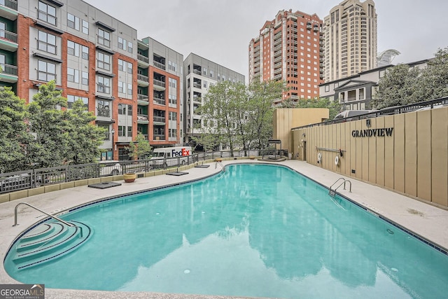 3481 Lakeside Dr NE Unit 1504, Atlanta, GA 30326 - pool featuring fence