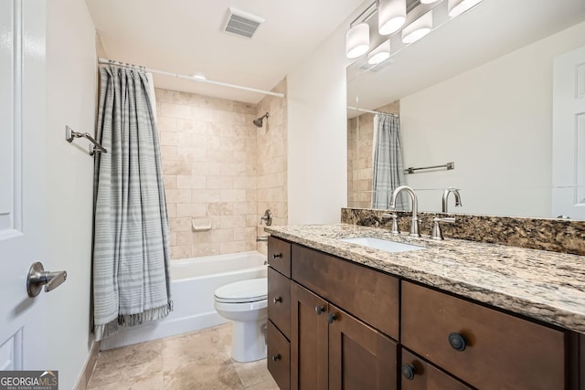 3481 Lakeside Dr NE Unit 1504, Atlanta, GA 30326 - bathroom featuring shower / tub combo with curtain, visible vents, toilet, and vanity