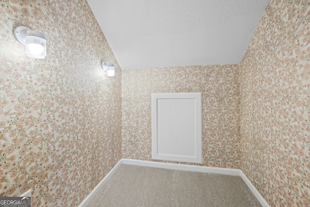 24 Hamilton Dr, Jefferson, GA 30549 - interior space with wallpapered walls, carpet floors, a textured ceiling, and baseboards