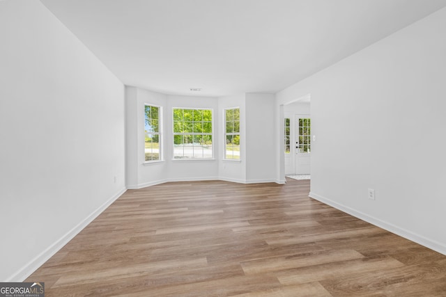 24 Hamilton Dr, Jefferson, GA 30549 - empty room featuring baseboards and light wood-type flooring