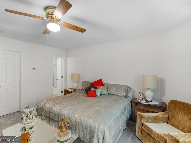 carpeted bedroom featuring ceiling fan