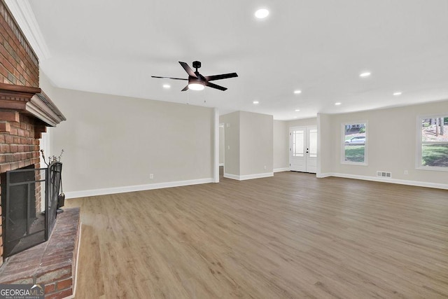 486 Edward Ct, Marietta, GA 30066 - unfurnished living room featuring a fireplace, wood finished floors, baseboards, recessed lighting, and a ceiling fan