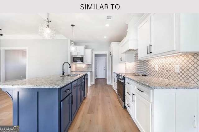 104 Reedy Ct, Perry, GA 31069 - kitchen with appliances with stainless steel finishes, white cabinetry, tasteful backsplash, light wood-style flooring, and ornamental molding