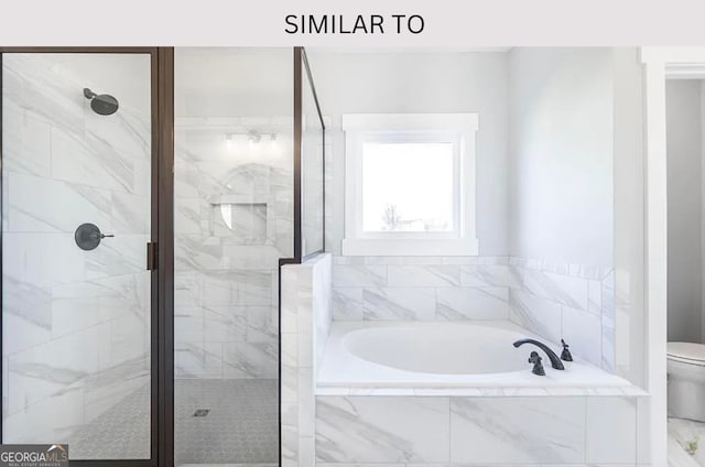 104 Reedy Ct, Perry, GA 31069 - bathroom featuring a garden tub and a shower stall