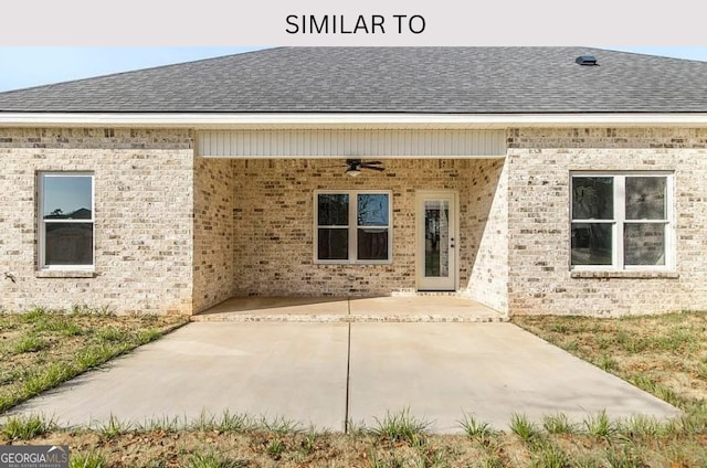 104 Reedy Ct, Perry, GA 31069 - rear view of property with a ceiling fan, roof with shingles, a patio area, and brick siding