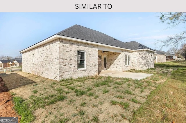 104 Reedy Ct, Perry, GA 31069 - rear view of property featuring a patio and ceiling fan