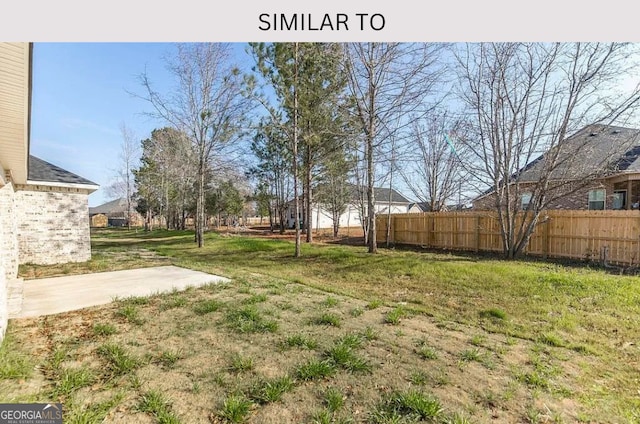 104 Reedy Ct, Perry, GA 31069 - view of yard featuring a patio