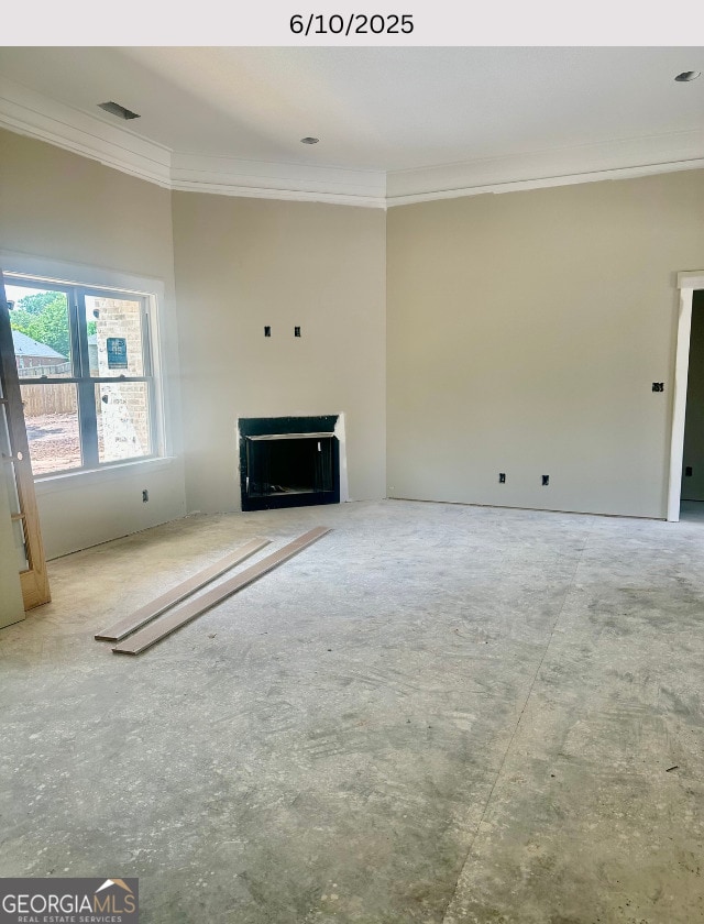 104 Reedy Ct, Perry, GA 31069 - unfurnished living room with crown molding and a fireplace