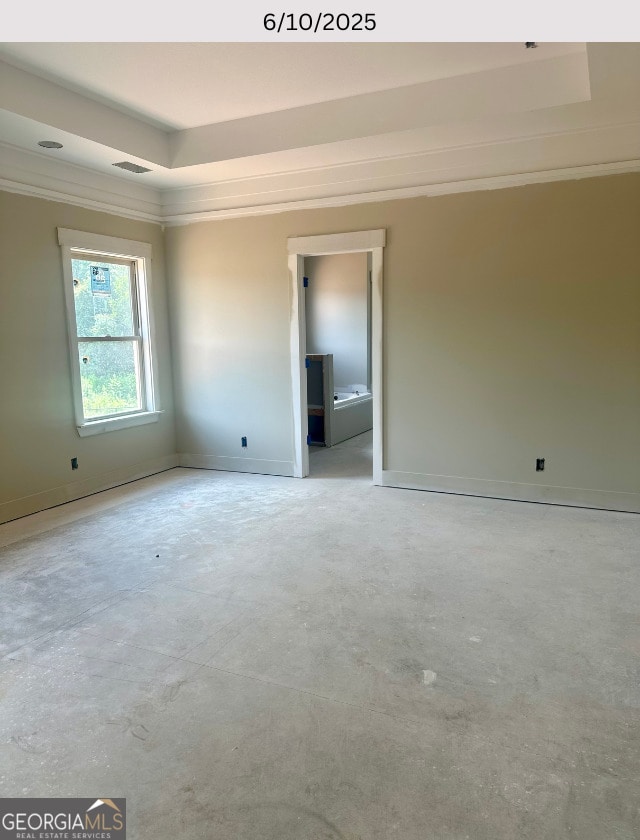 104 Reedy Ct, Perry, GA 31069 - spare room featuring ornamental molding and a raised ceiling