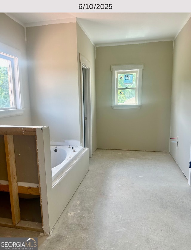 104 Reedy Ct, Perry, GA 31069 - full bathroom with a garden tub, ornamental molding, and concrete flooring