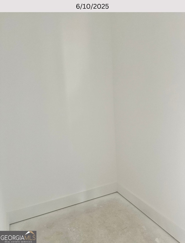 104 Reedy Ct, Perry, GA 31069 - spare room with baseboards and finished concrete floors