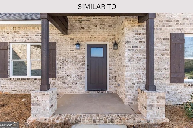 104 Reedy Ct, Perry, GA 31069 - property entrance featuring brick siding