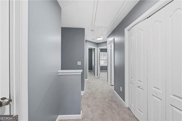 720 Georgetown Ln, Jonesboro, GA 30236 - hall featuring attic access, carpet, and baseboards