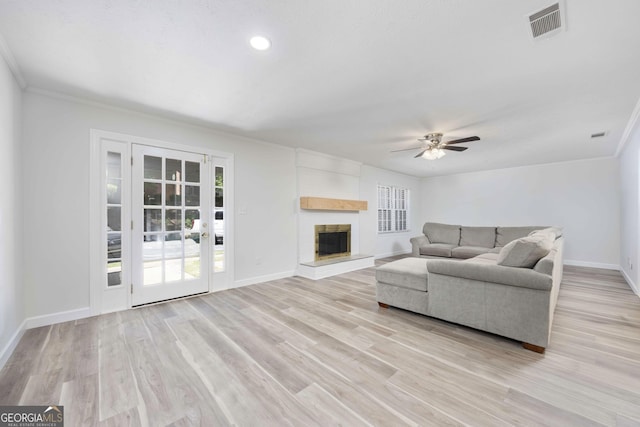 6101 River Rd Apt 20, Columbus, GA 31904 - living room with light wood-type flooring, baseboards, visible vents, ceiling fan, and crown molding