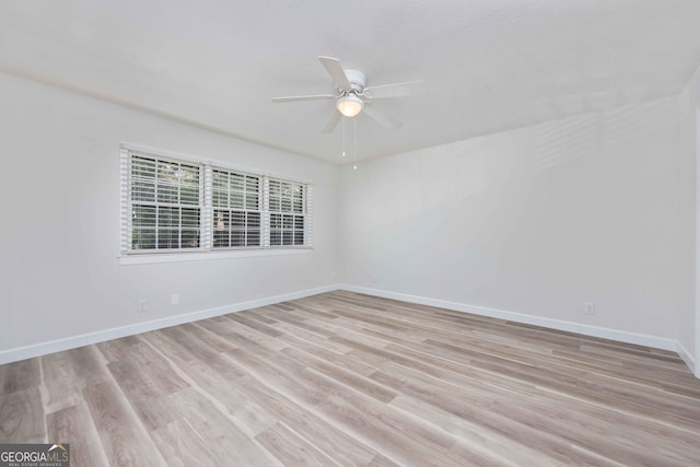 6101 River Rd Apt 20, Columbus, GA 31904 - spare room featuring a ceiling fan, baseboards, and light wood-style flooring