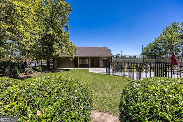 6101 River Rd Apt 20, Columbus, GA 31904 - back of property with a patio area, a lawn, and fence