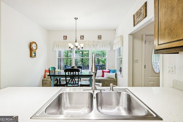 kitchen with pendant lighting and a chandelier