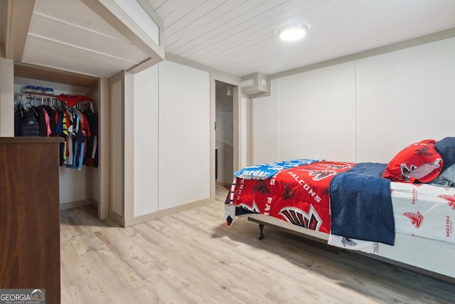 bedroom with wood finished floors