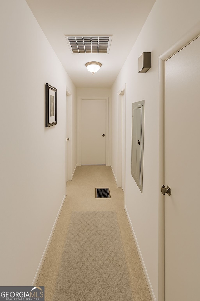 3272 Kingston Rd, Atlanta, GA 30318 - hallway with electric panel, baseboards, visible vents, and light colored carpet