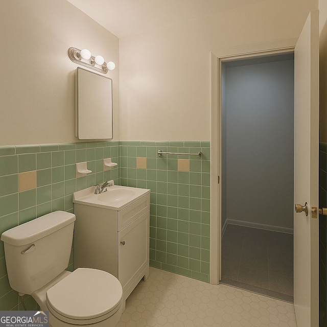 3272 Kingston Rd, Atlanta, GA 30318 - half bath with tile walls, wainscoting, vanity, and toilet
