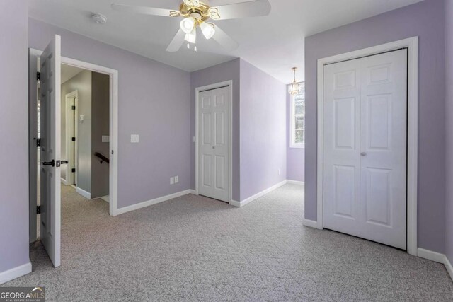 160 Keese Ln, Fair Play, SC 29643 - unfurnished bedroom with ceiling fan, baseboards, and light carpet