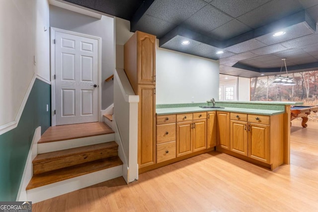160 Keese Ln, Fair Play, SC 29643 - interior space featuring a peninsula, a sink, light wood finished floors, and light countertops
