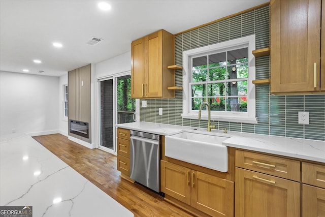 800 Kiowa Dr NE, Marietta, GA 30060 - kitchen with open shelves, stainless steel dishwasher, a sink, backsplash, and recessed lighting