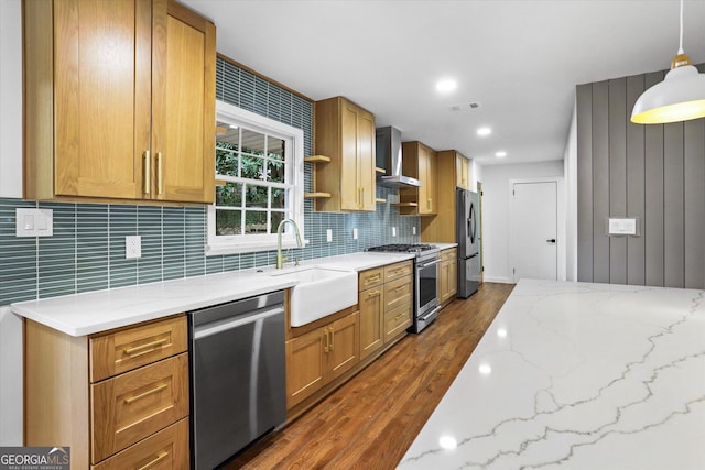 800 Kiowa Dr NE, Marietta, GA 30060 - kitchen featuring appliances with stainless steel finishes, wall chimney range hood, a sink, dark wood-style floors, and tasteful backsplash