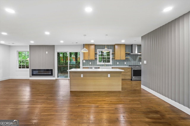 800 Kiowa Dr NE, Marietta, GA 30060 - kitchen featuring open shelves, stainless steel gas range, a center island, light countertops, and dark wood-style flooring