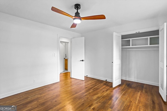 800 Kiowa Dr NE, Marietta, GA 30060 - unfurnished bedroom featuring wood finished floors, a closet, baseboards, and a ceiling fan