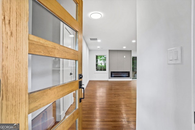 800 Kiowa Dr NE, Marietta, GA 30060 - unfurnished living room featuring wood finished floors, recessed lighting, and baseboards