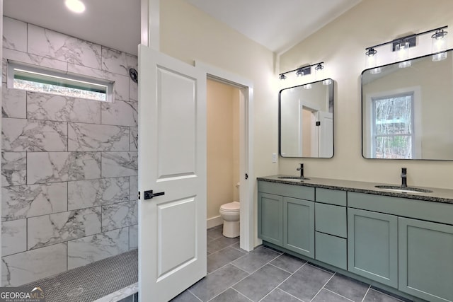 162 Forest Canopy Way, Clayton, GA 30525 - full bath featuring a sink, a walk in shower, toilet, and double vanity