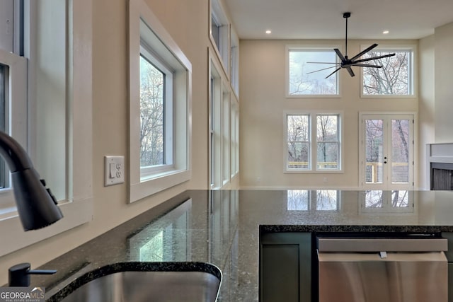 162 Forest Canopy Way, Clayton, GA 30525 - interior space featuring dark stone counters, recessed lighting, a ceiling fan, and dishwasher