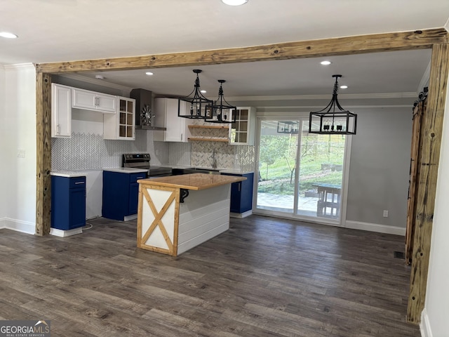 kitchen with blue cabinets, stainless steel electric stove, a chandelier, wall chimney range hood, and a kitchen island