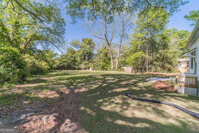 view of yard featuring fence