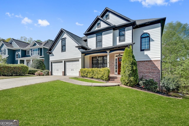 traditional-style home with brick siding, an attached garage, driveway, and a front lawn