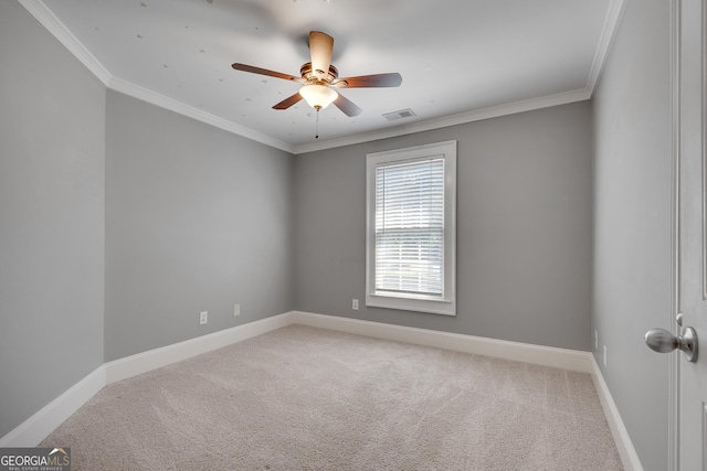 unfurnished room with baseboards, carpet flooring, and visible vents