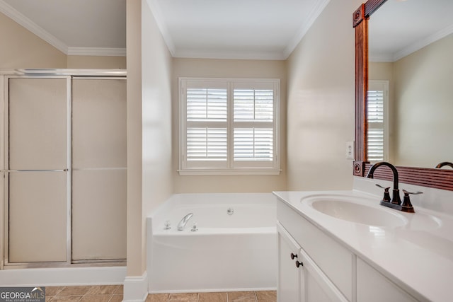 bathroom with vanity, a stall shower, and a wealth of natural light